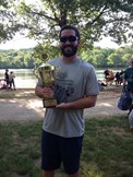 Sam DeAngeli holding trophy